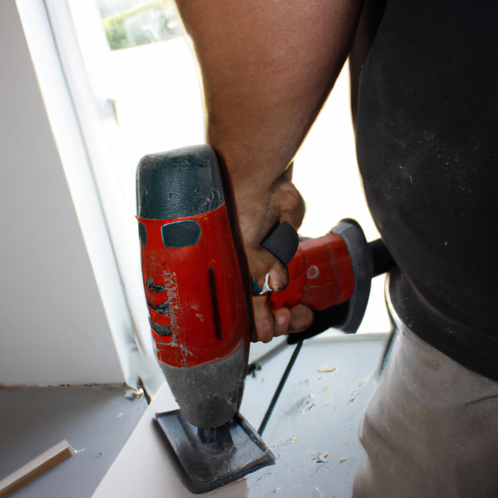 Person using power tools, renovating